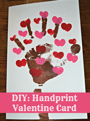 Handprint Valentine's Day Card made with fingerprint hearts