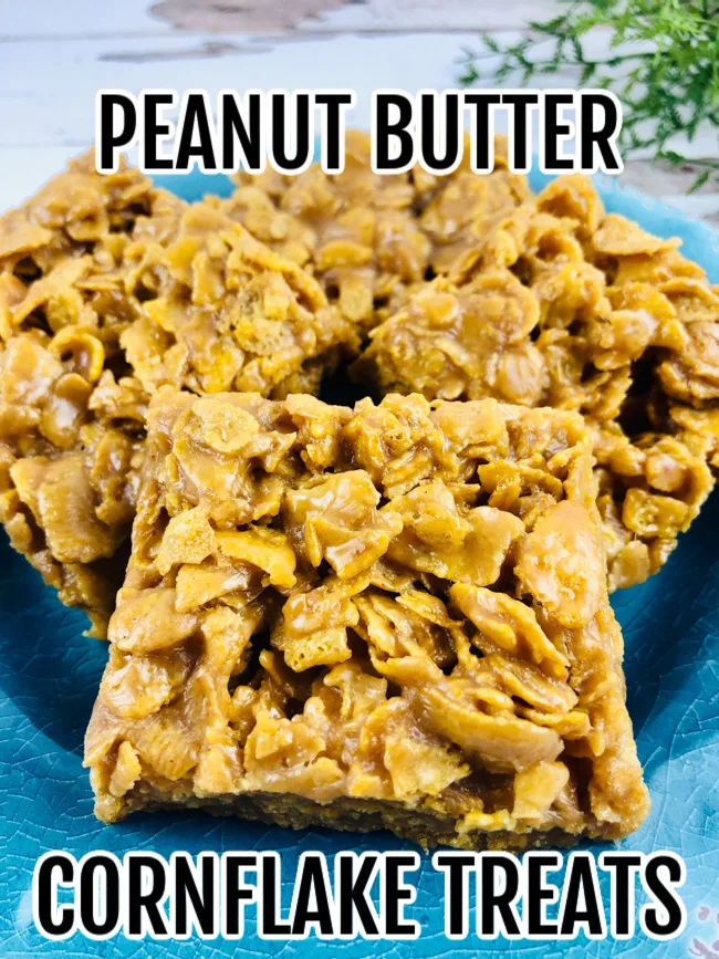 Peanut Butter Cornflake Treats on a blue dessert plate