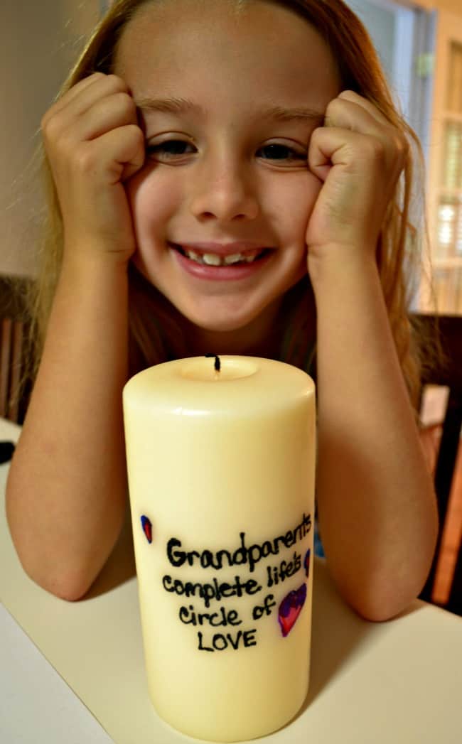Picture of my daughter and the finished grandparent's candle 