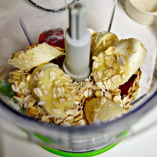 apple banana and oat smoothie ingredients in a mixer