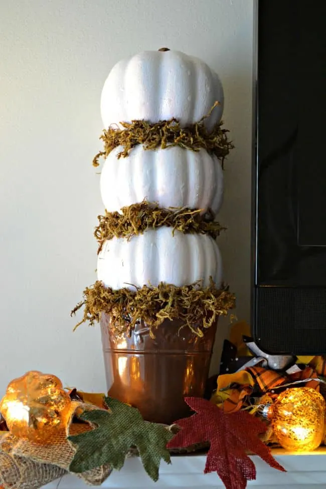 This quick and easy 3 tiered pumpkin topiary craft is perfect to add a touch of fall to your home all for around $5 total. 