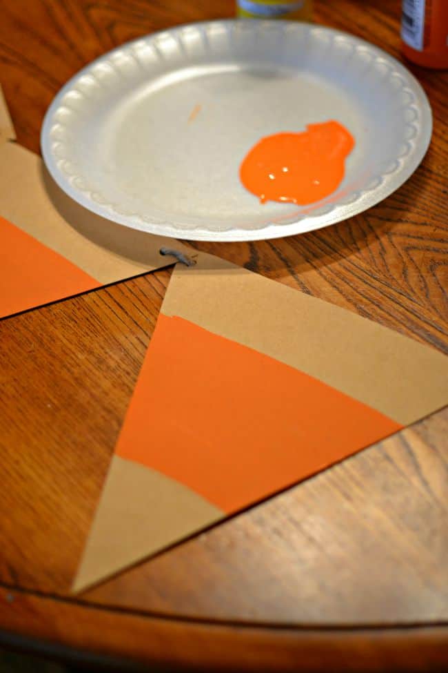 Love this super simple to make $1 candy corn banner. 