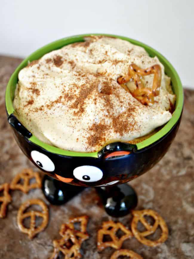 This creamy pumpkin cheesecake dip is perfect for your next fall party. It whips up in less than 10 minutes and you are good to go. Great with salty pretzels, apples and more.