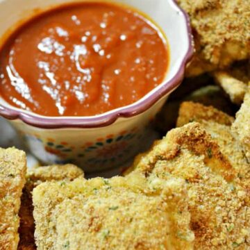 These baked ravioli appetizers are perfect for your holiday or game day parties. Very similar to Olive Garden's toasted ravioli's. So yummy and broiled for a crispy goodness.