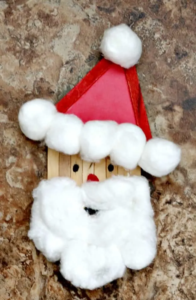 While your kids are waiting for Santa how about creating Santa with this really cute Popsicle Stick Santa craft. All you need is a few simple supplies.