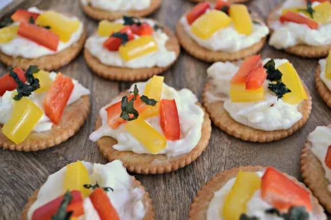 These Roasted Pepper Cheese Bites are so delicious. The smell of the roasted peppers and basil is devine and the garlic butter RITZ crackers add that perfect savory bite.