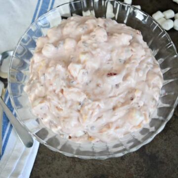 If you love marshmallow fluff salad then you will definitely want to give this Cherry Fluff Salad a try. So yummy! Perfect for any party or family gathering.