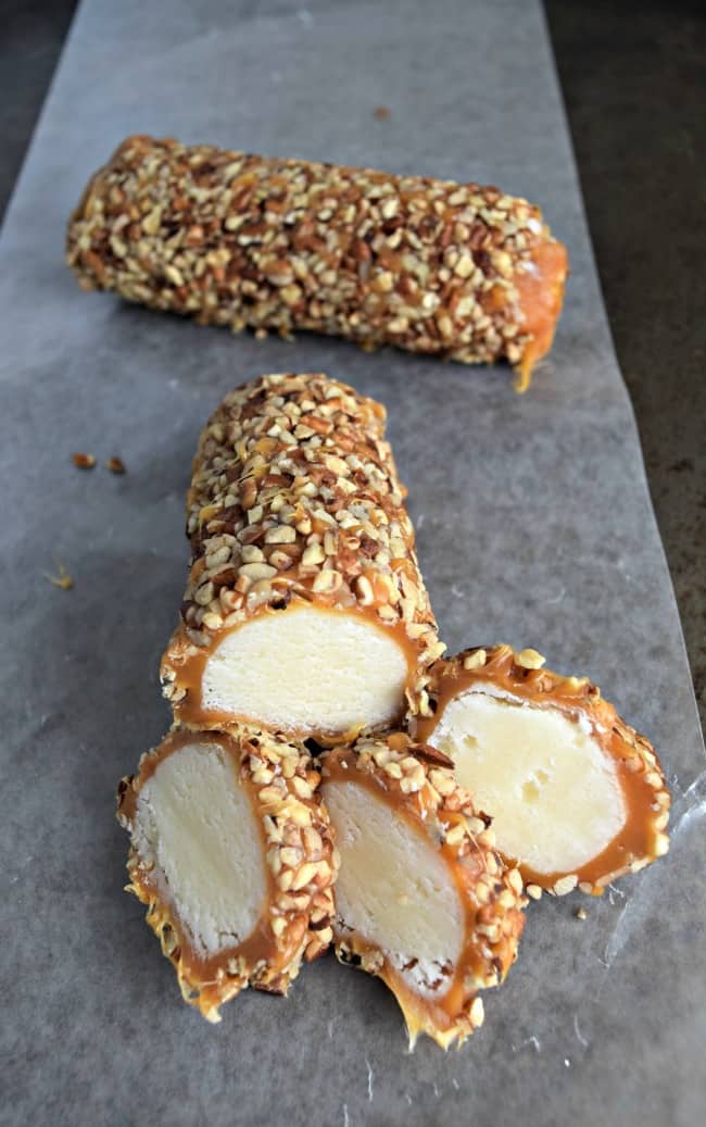 This Pecan Log Roll Recipe makes approx. 8 delicious pecan logs covered in creamy caramel and crunchy pecans. Perfect candy to gift to family and friends.