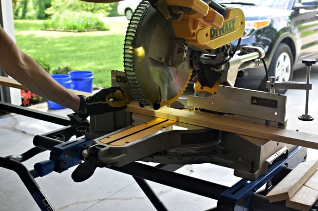 Cutting the side pieces to the cornhole board.