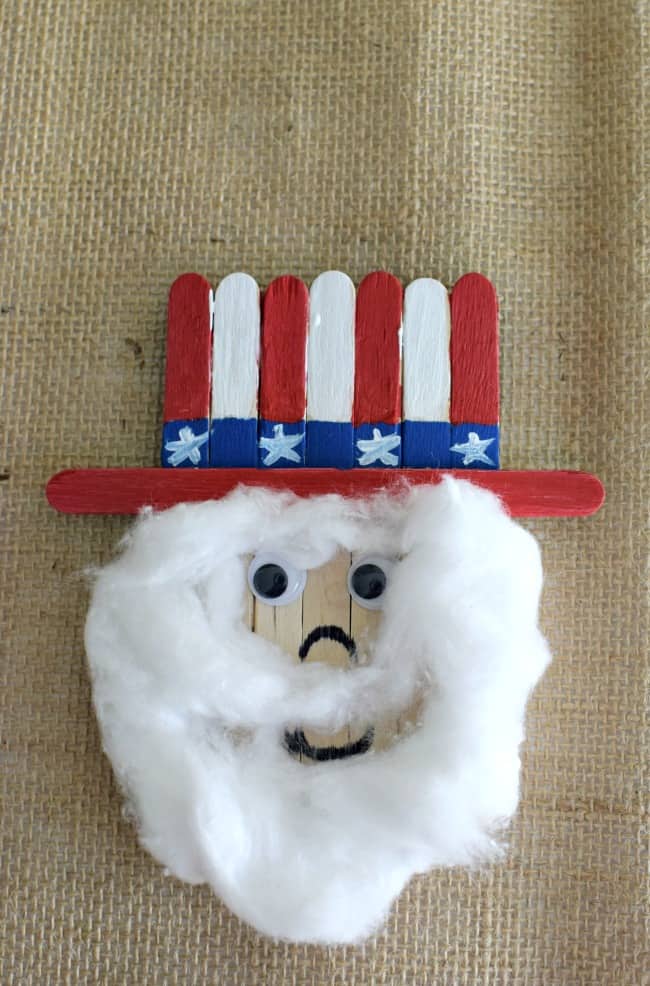 Celebrate 4th of July with your kids this year by creating this super cute popsicle stick Uncle Sam. 