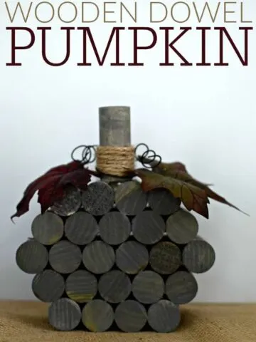 This super simple and inexpensive wooden dowel pumpkin cost less than $5 dollars and 30 minutes to make. Fun homemade fall and Halloween holiday decor!