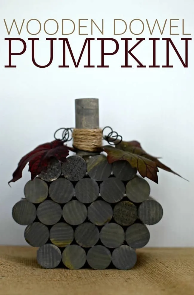 This super simple and inexpensive wooden dowel pumpkin cost less than $5 dollars and 30 minutes to make. Fun homemade fall and Halloween holiday decor!