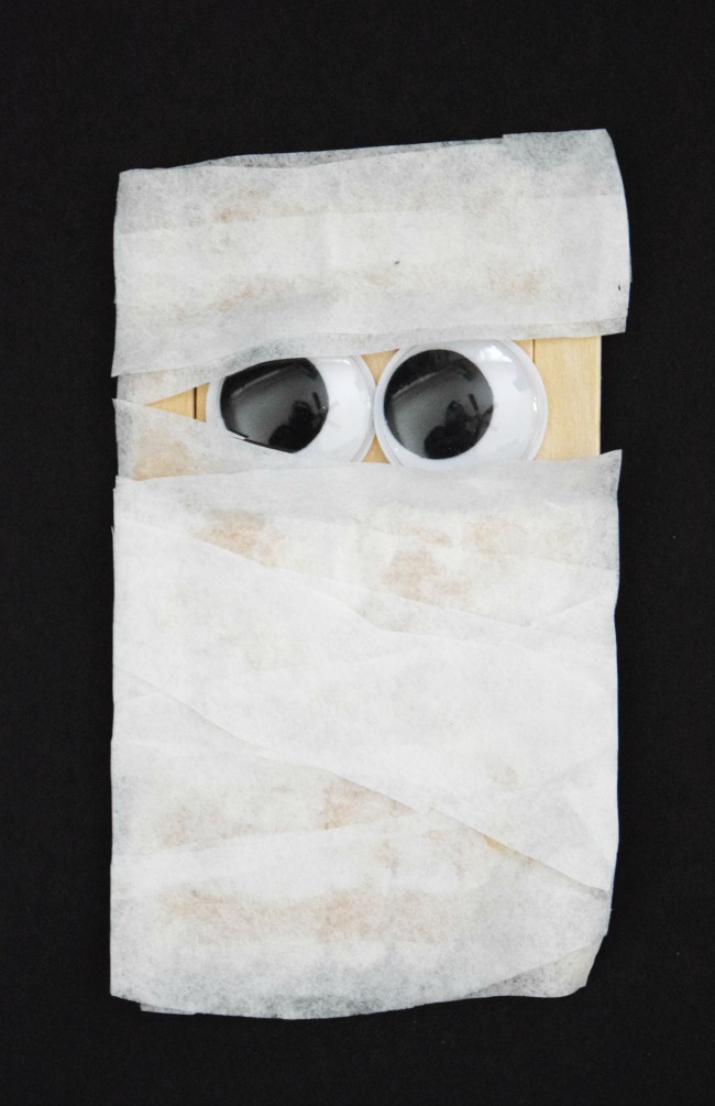 Popsicle Stick Mummy made out of craft sticks and coffee filters.