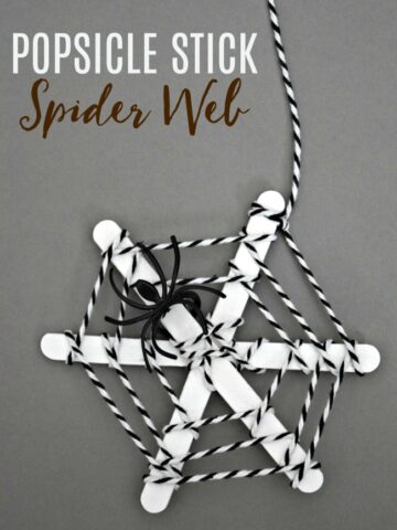 Popsicle stick spider web, the kids will love helping to create these fun web using craft sticks and yarn. Hang several in a window for a fun touch.