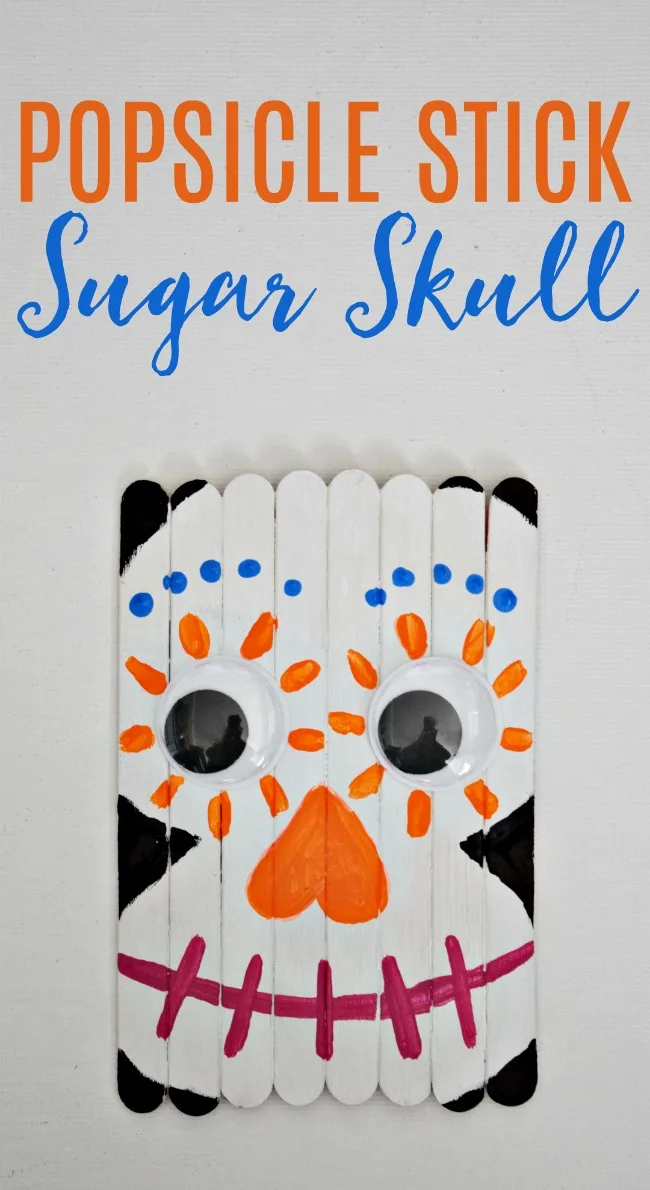 Celebrate the Day of the Dead with this fun and colorful Popsicle Stick Sugar Skull. A great craft for the new Disney movie, Coco!  #Halloween #PopsicleStickCrafts #kidcrafts #sugarskull #DayoftheDead #CoComovie #Disney