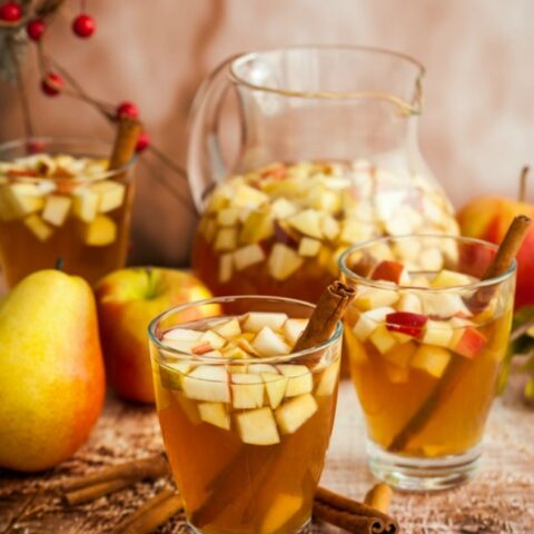 Apple Cider Sangria filled with some of your favorites white wine, apple cider, brandy, apples, and pears. A fun and festive drink for the season.