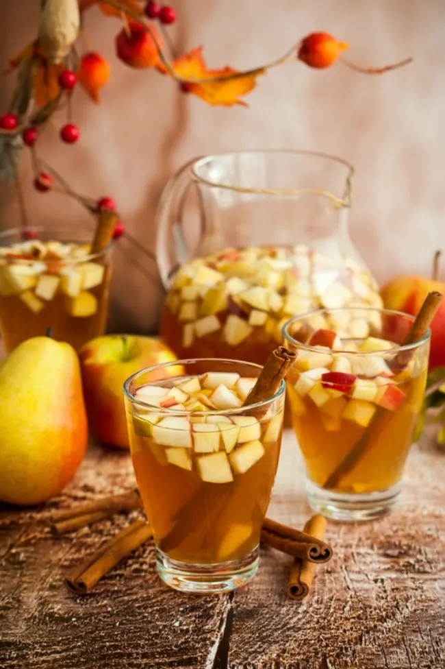 Apple Cider Sangria filled with some of your favorites white wine, apple cider, brandy, apples, and pears. A fun and festive drink for the season.