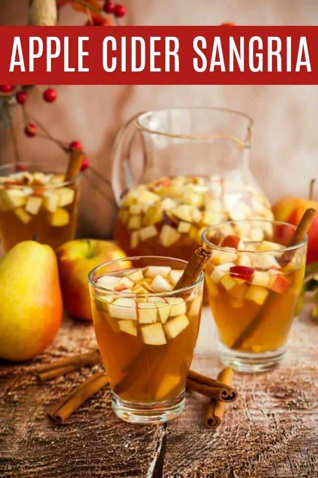 Apple Cider Sangria filled with some of your favorites white wine, apple cider, brandy, apples, and pears. A fun and festive drink for the season. #Recipes #AppleCider #Apples #Sangria #AppleCiderSangria #Fall #Beverage