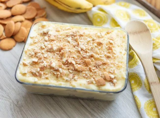 Classic Southern Banana Pudding starts with layering Nilla wafers and perfectly ripe banana slices. Topped with delicious homemade vanilla pudding.