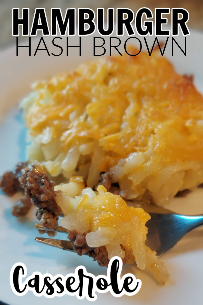 A small white plate with a slice of Hamburger Hashbrown Casserole piled on top