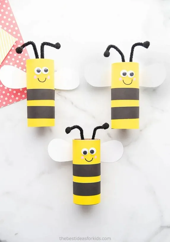 3 Toilet Paper Rolls that are decorated like bumble bees