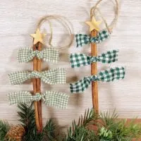 This photo features scrap fabric christmas tree ornaments perfect for holiday crafting also using cinnamon sticks and wooden stars.