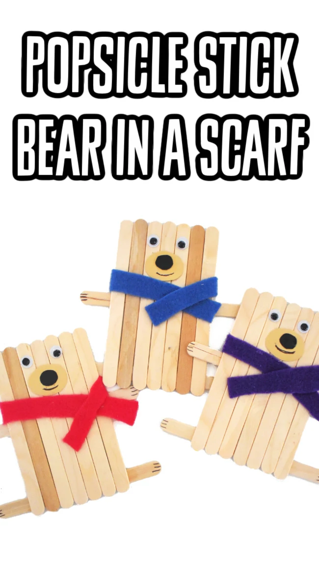 This photo features 3 popsicle stick bear crafts in colorful scarfs.