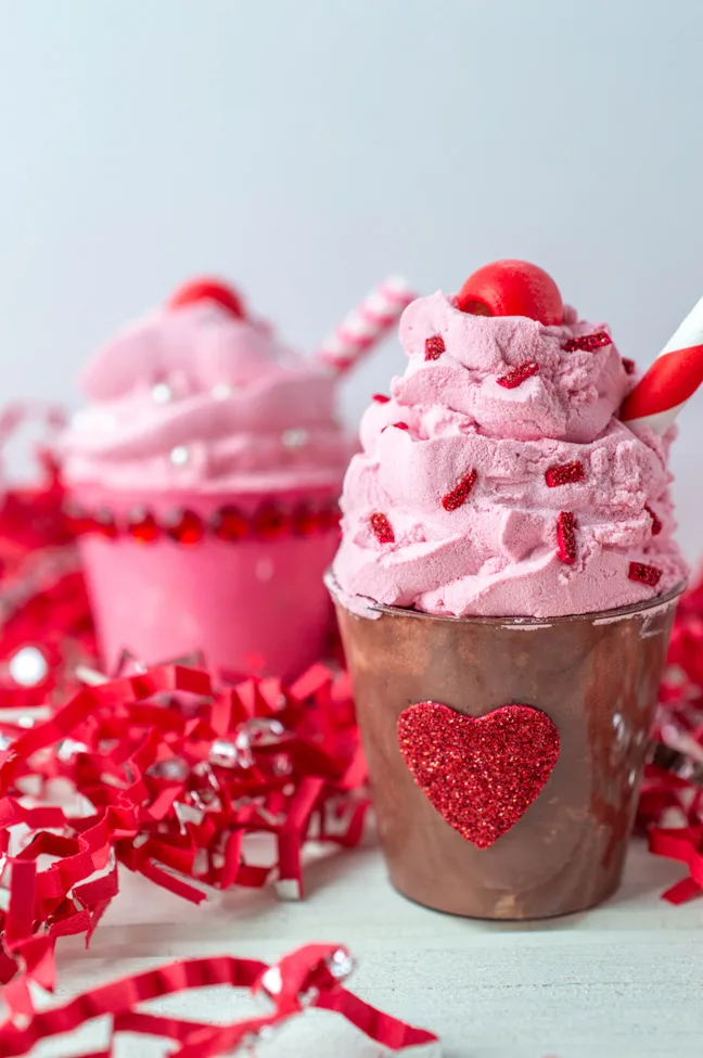 This photo features to made faux milkshakes for Valentine's Day. 