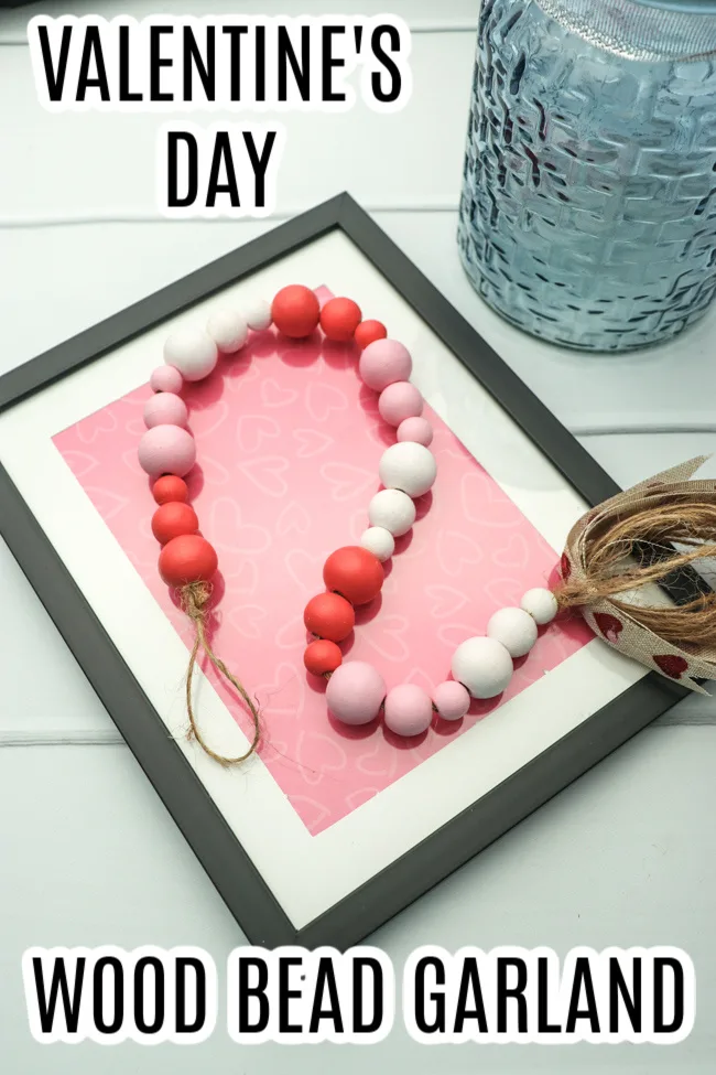 This photo features a made wood bead garland painted up for Valentine's Day.