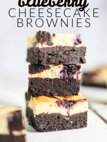 A stack of blueberry cheesecake brownies