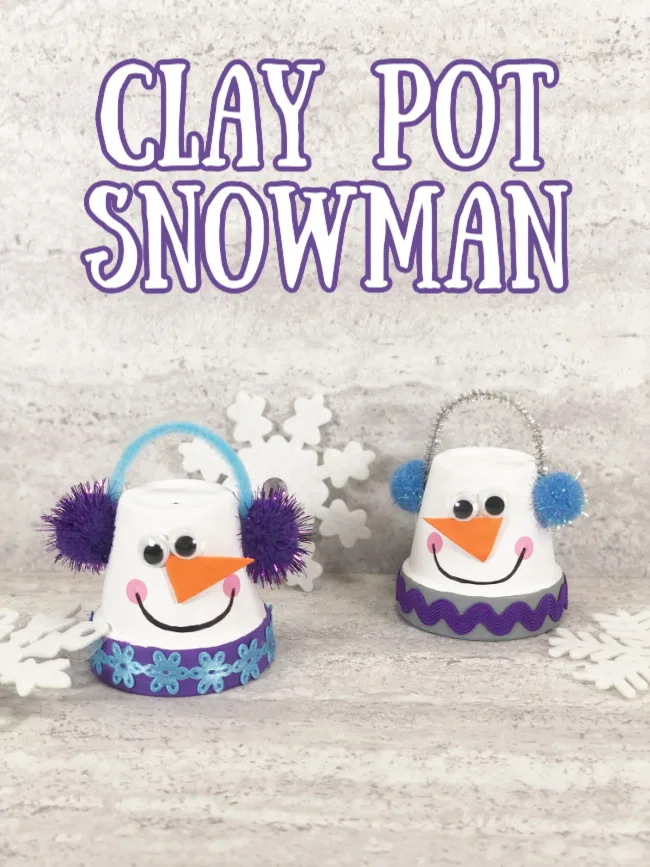 Clay pot snowman craft made with mini pots, pipe cleaners, pom poms, and more on a wood background