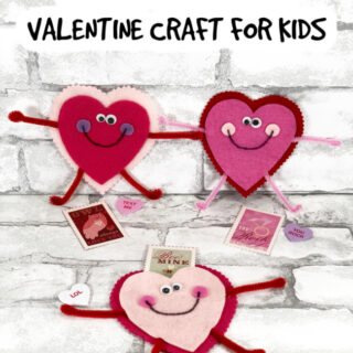 Felt Heart People Craft with posable stem legs on a white background.