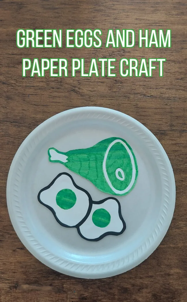 Green Eggs and Ham Paper Plate Craft on a wooden background