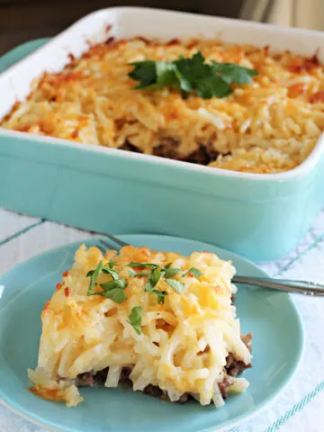 Hamburger Hash Brown Cassrole with some put on a separate dish.