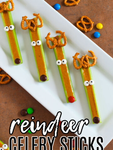 Peanut Butter Reindeer Celery Sticks on a white platter.