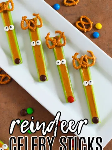 Peanut Butter Reindeer Celery Sticks on a white platter.