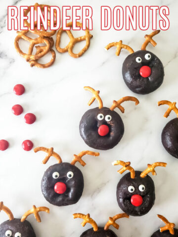 Store bought chocolate donuts decorated to look like reindeer donuts.