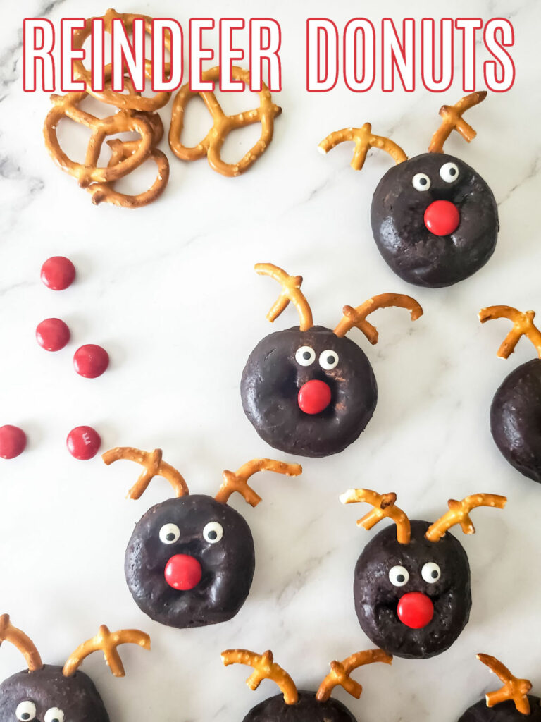 Store bought chocolate donuts decorated to look like reindeer donuts.