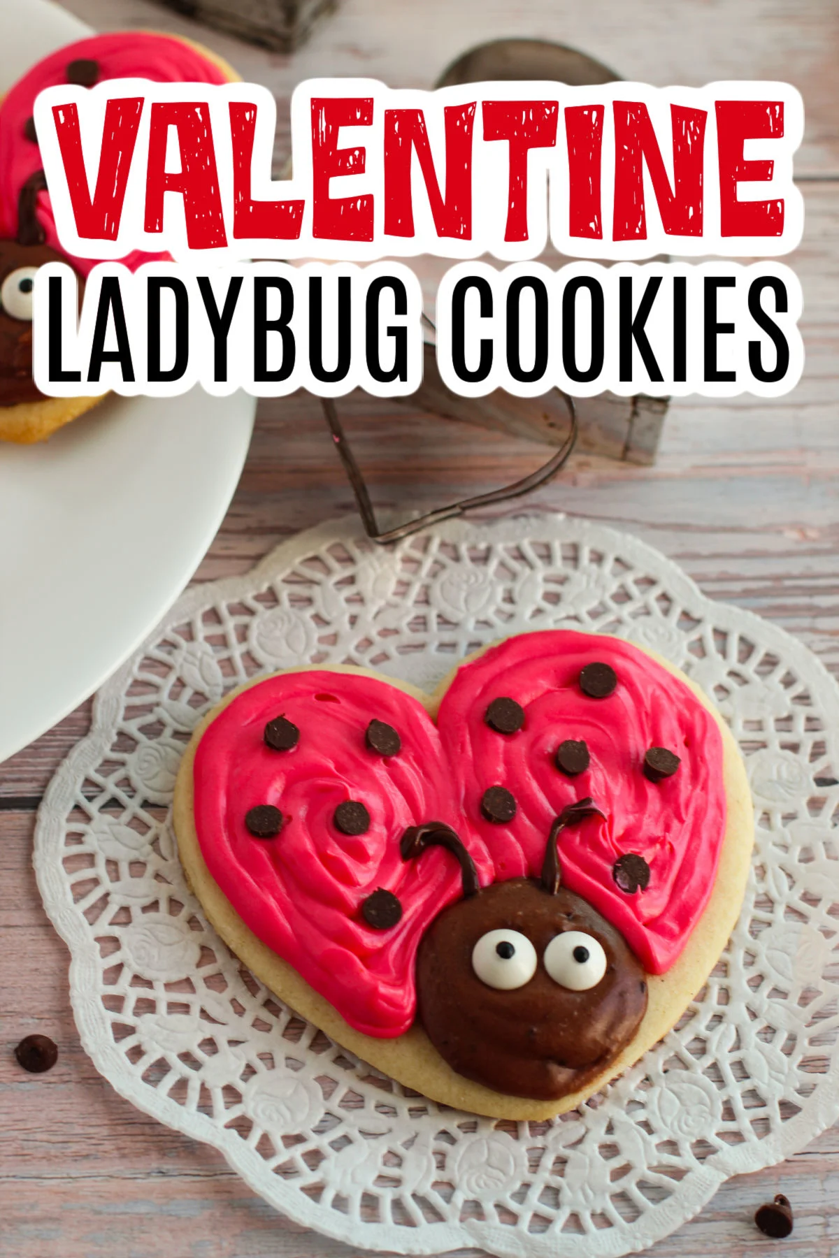 Ladybug Cookies on a white paper doily.