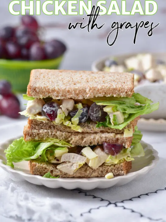 Chicken Salad Recipe with Grapes double stacked on a white plate.