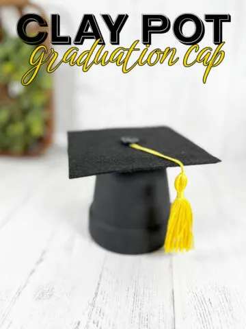 Black Clay Pot Graduation Cap with a yellow tassel
