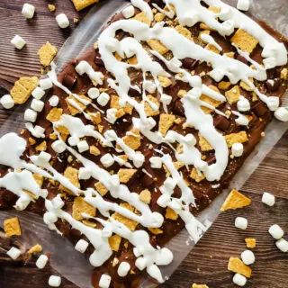 Smores Bark spread out on a baking pan.