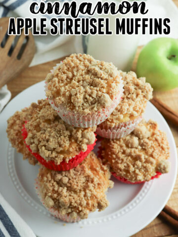 a stack of Apple Streusel Muffins on a white plate