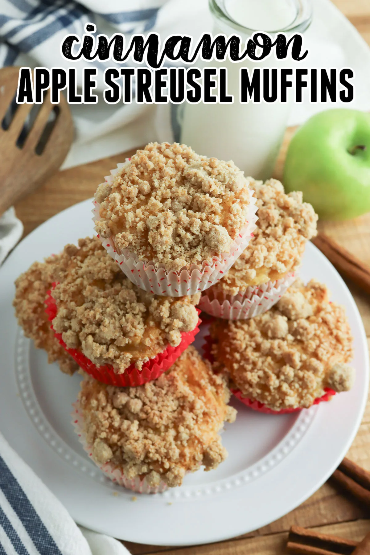 a stack of Apple Streusel Muffins on a white plate