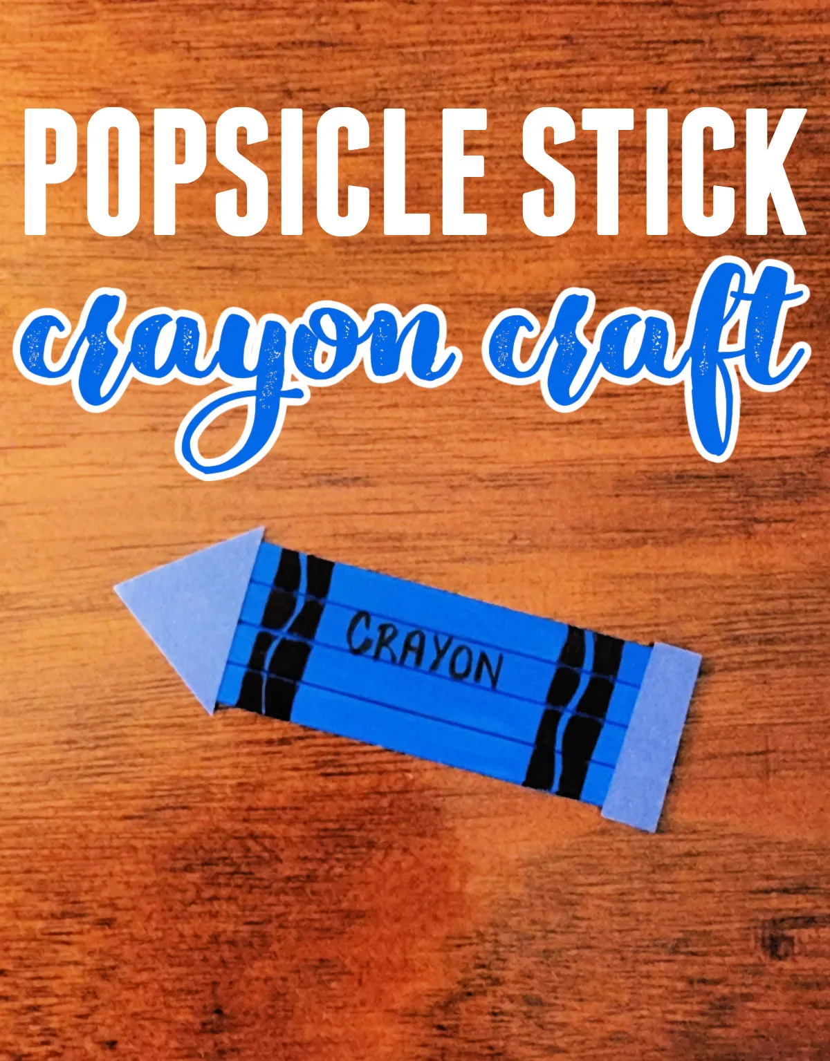 Popsicle Stick Crayon craft on a wooden background