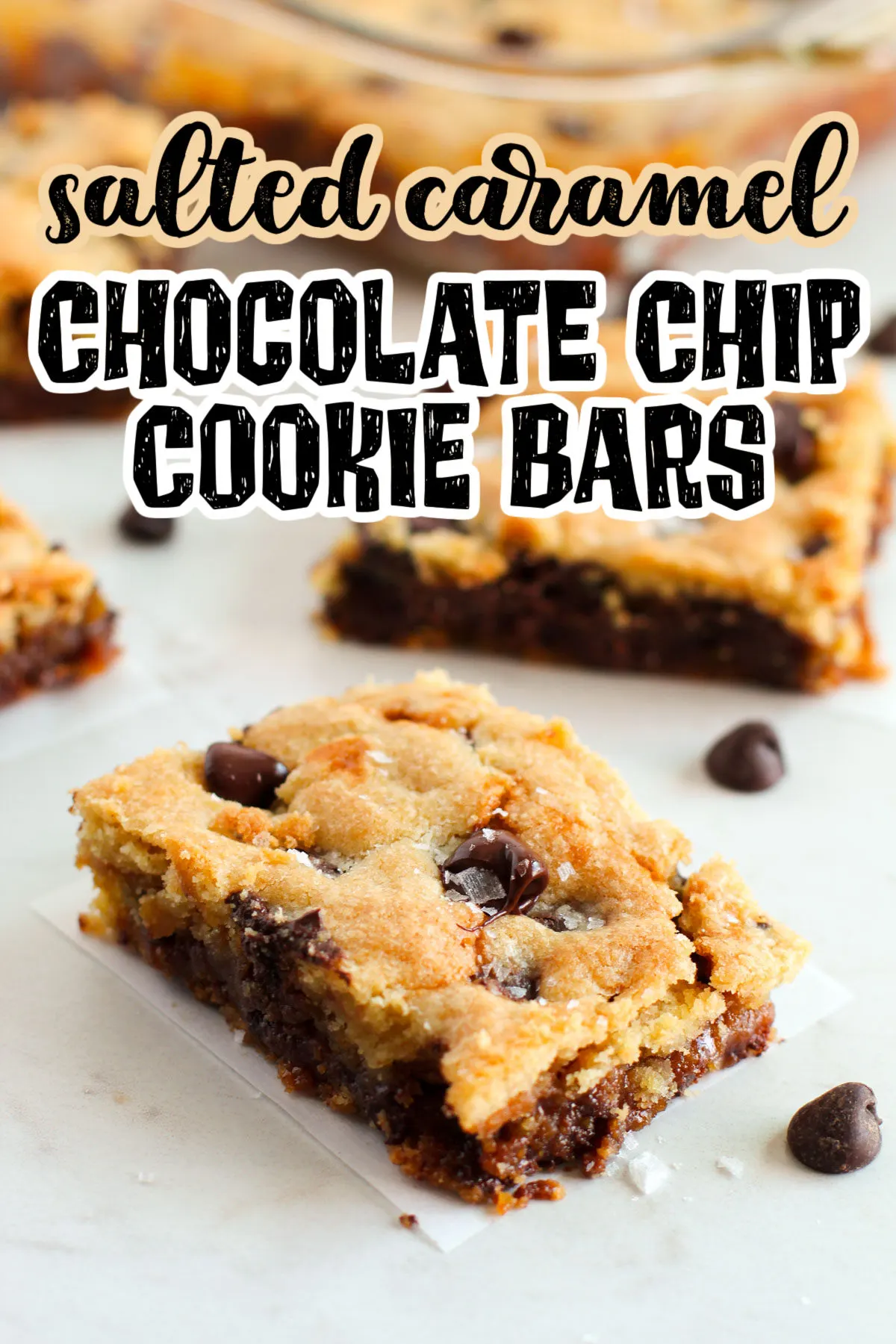 Salted Caramel Chocolate Chip Cookie Bars cut into bars on a white counter.