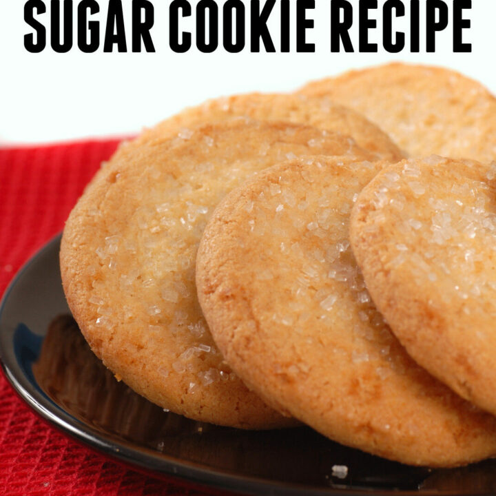 A black plate of sugar cookies with the title the best sugar cookie recipe