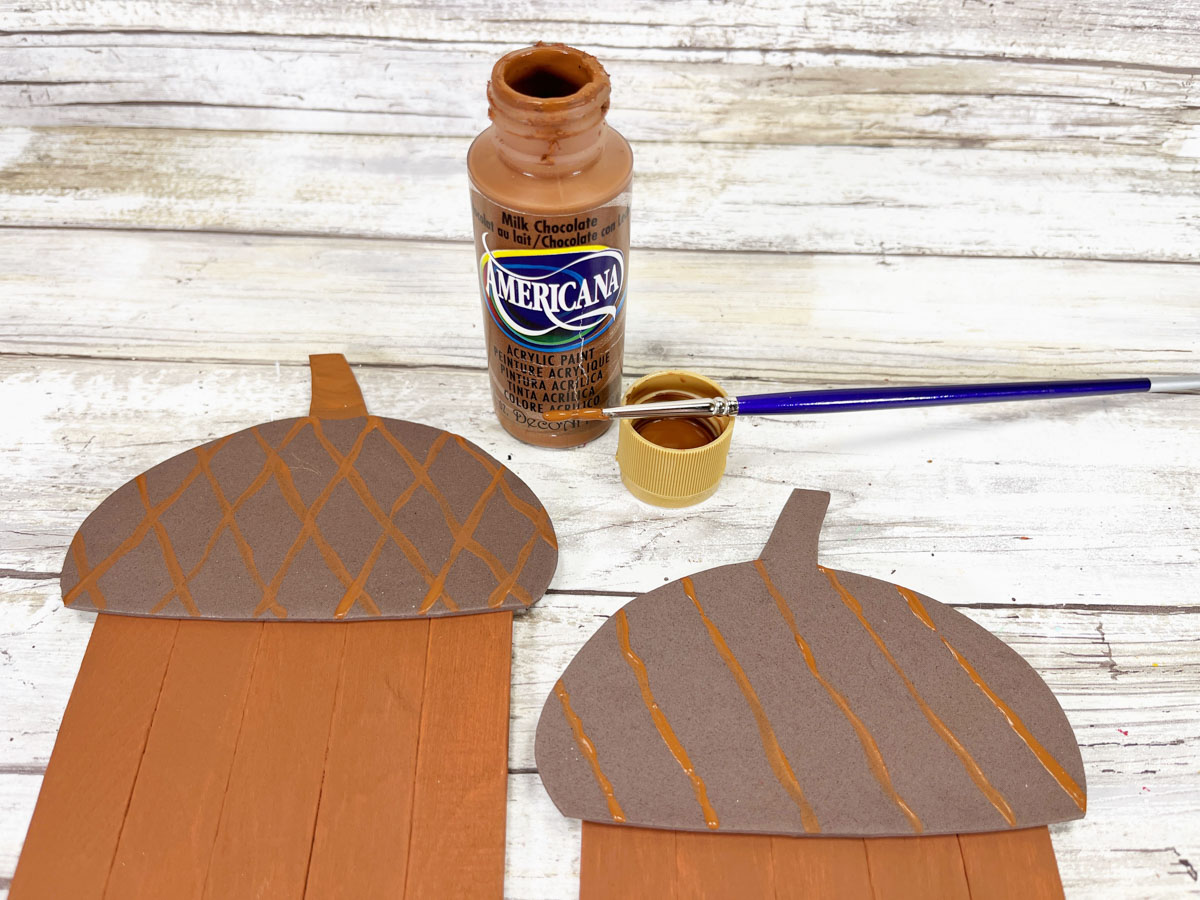 Steps to create a popsicle stick acorn